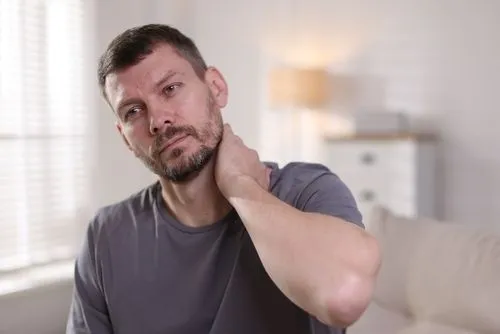 man with neck pain