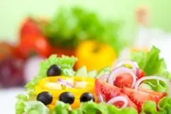 Nutritious foods being shown to a patient at North Jersey Chiropractic Rehabilitation Center