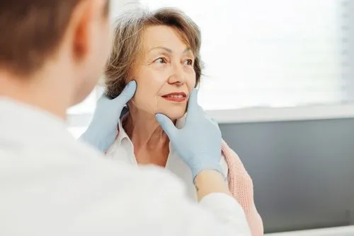 Senior woman consulting a specialist about facial wrinkles