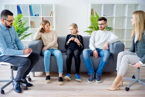 Family sitting together during counseling session