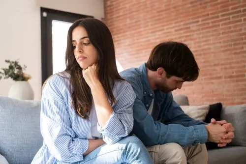 Man and woman not looking to each other