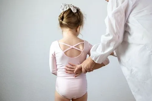 Doctor checking on the young girl