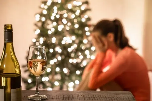 Woman feeling depress during holday with Christmas Tree
