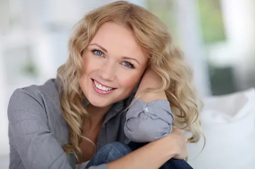 Photograph of smiling woman after receiving Cosmetic Dentistry, Huntsville, AL