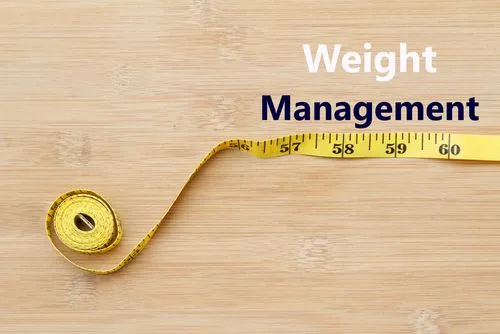 Weight management concept illustrated with tape measure