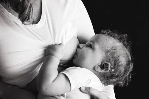 black and white breastfeeding