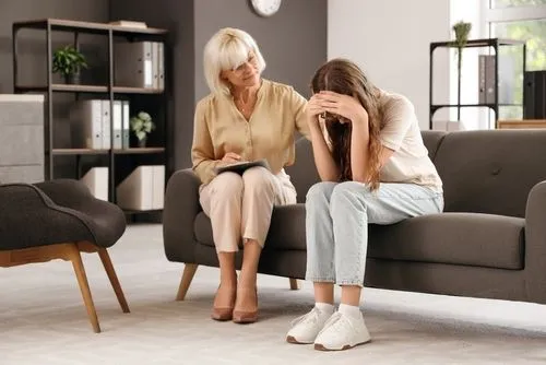 Woman during trauma counseling session with therapist
