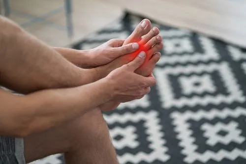 Person suffering from arthritis in red highlights