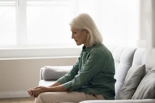 Senior woman suffering from depression and anxiety