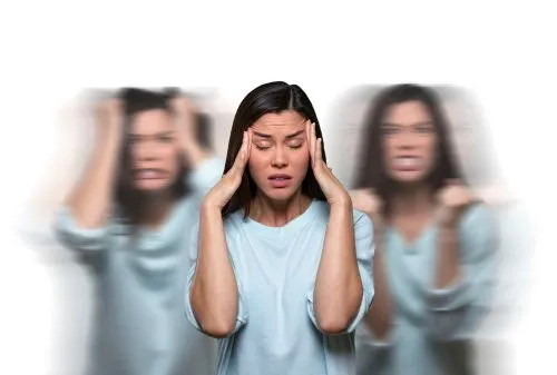 Woman displaying different facial expressions representing mood disorder.