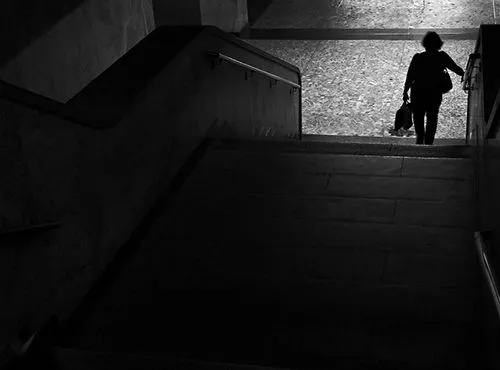 woman going down stairs