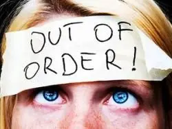 out of order tape on a womans head