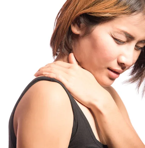 Female holding shoulder in pain