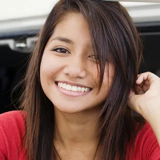 teen Hispanic girl smiling nice teeth, oral surgery Selmer, TN dentist