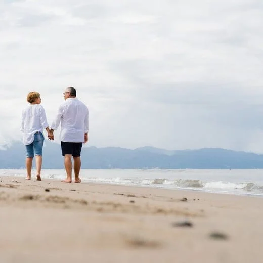 couple walking together on beach