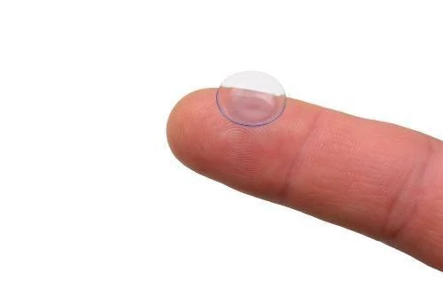 Man holding his Ortho-K contact lenses