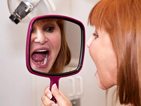 Checking Teeths for Dental Implants Warren MI