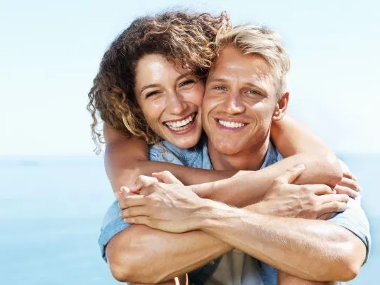 Couple with Dental Implants Shelby Township MI