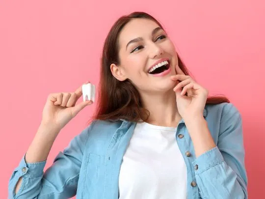 Smiling Girl with Dental Implants Model  Macomb, MI