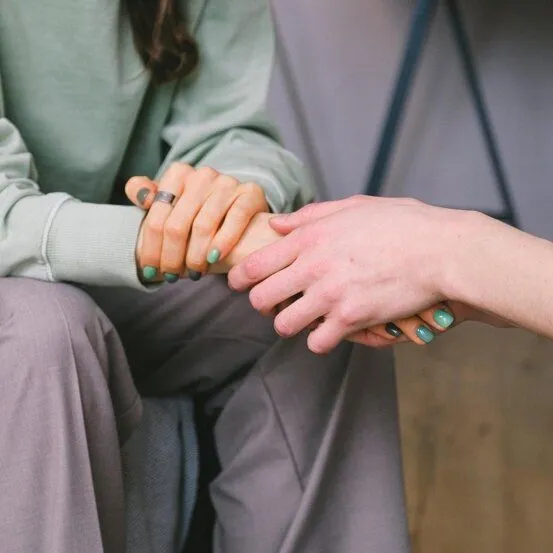 people holding hands