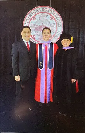 Dr. Nelson Pan, Dr. Jeffrey Pan in graduation gown, and Dr. Debra Pan, family dentist Melrose, MA