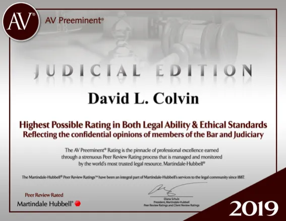 David L. Colvin accepting a plaque for service as the President of the Jefferson Bar Association. 