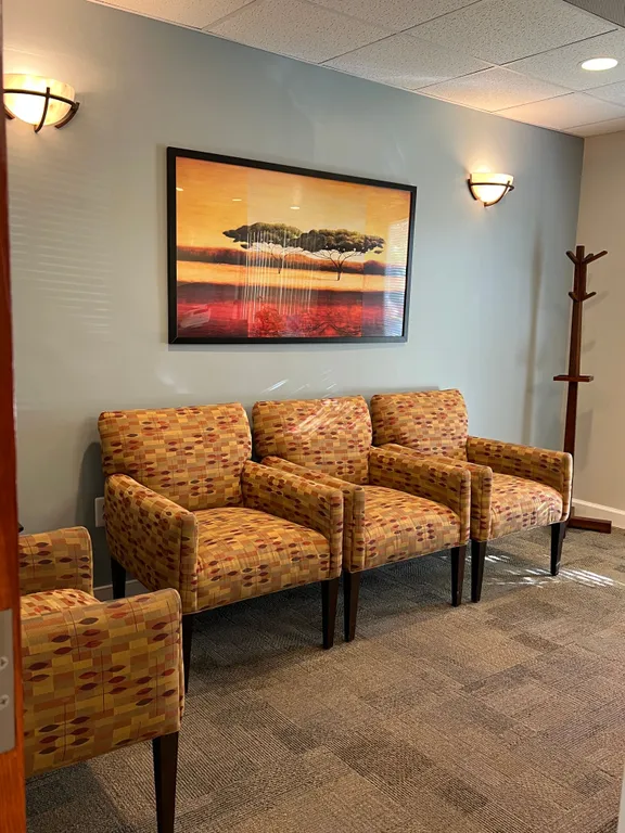 waiting room with chairs, office of Dr. Amir Sarkarzadeh, endodontist in Germantown, MD
