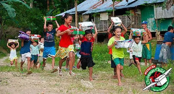 children running with presents in hand