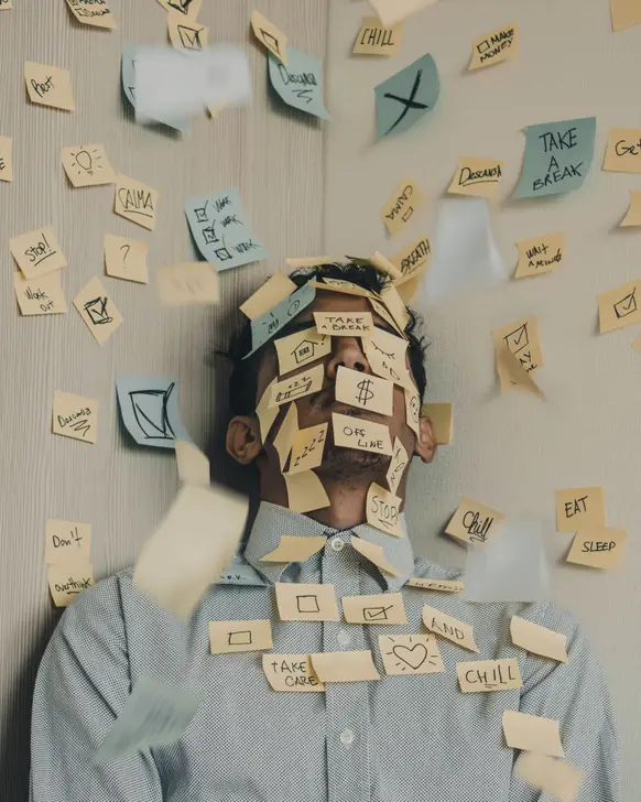 man covered in sticky notes