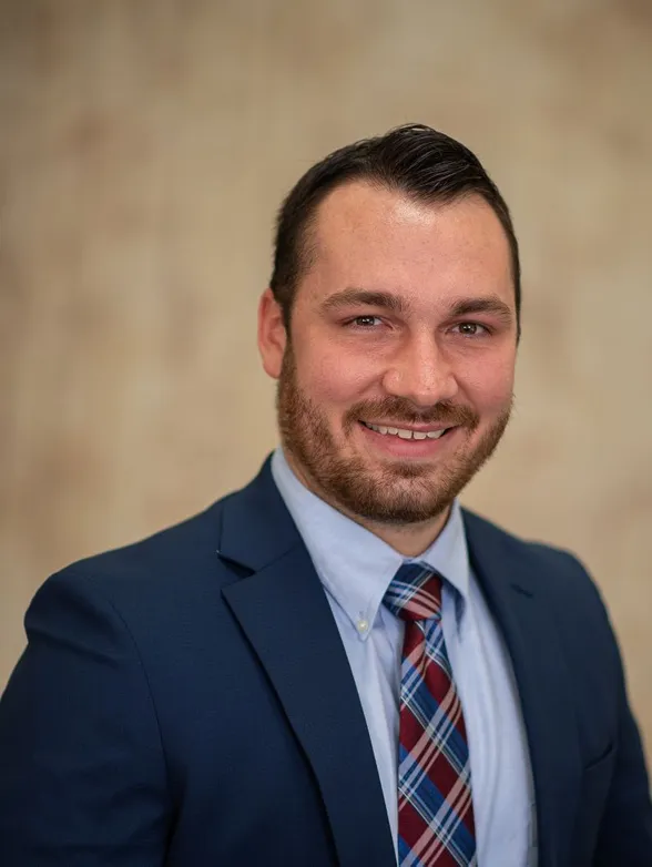 photograph of a man in a suit