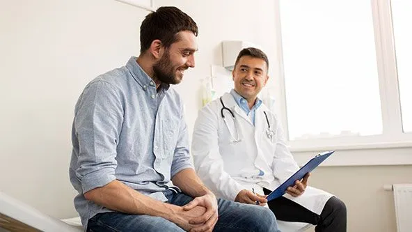 doctor speaking with patient