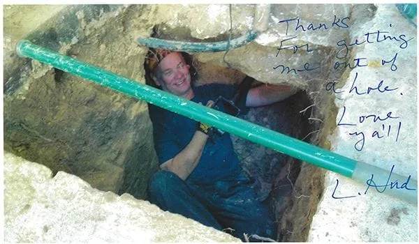 image of man in a hole