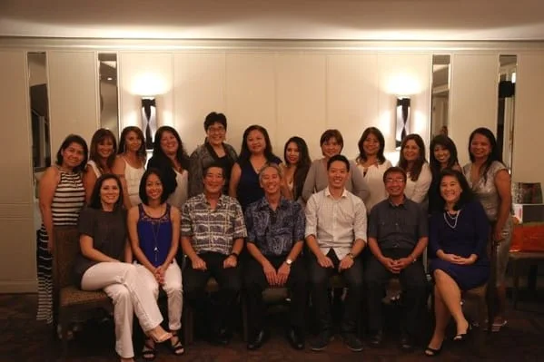 Photo of Aiea Pearl City Dental Care Team Photo Top Row Left to Right Rechie Sherri Dee Venice Karen Vangie Vilma Robbie Lydia Doreen Laurie Teo Bottom Row left to right Sandie Tracy Dr Nakamura Dr Matsuura Dr BLake Danny Kim; 