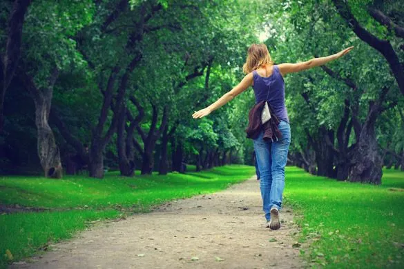 A woman walking on the park