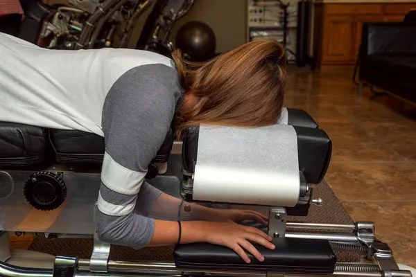 woman on drop table