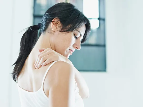 Woman Experiencing Neck Pain