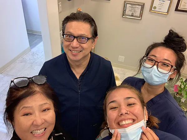 Dr. Dino Dee and dental staff in office, dentist Honolulu, HI 