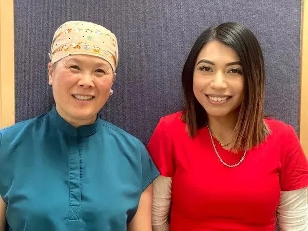 two female dental staff members smiling, kids dentist Millbrae, CA pediatric dentistry