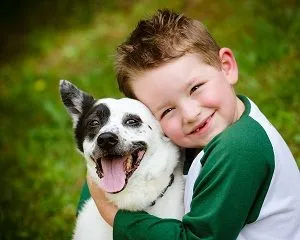 child with a dog