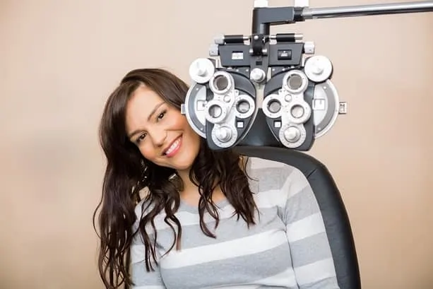 Woman getting her eyes examined