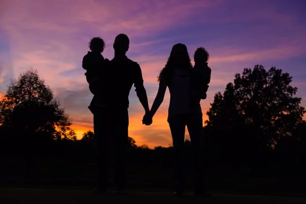 Family of Four at Sunset