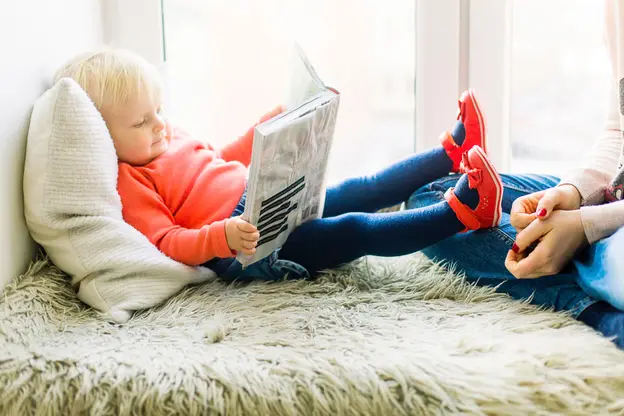 child reading book