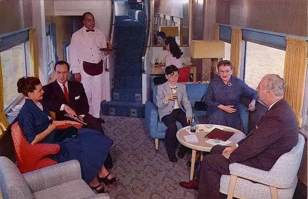 People in Train car common area