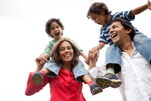 Happy family playing together after family dentistry visit in North Little Rock, AR