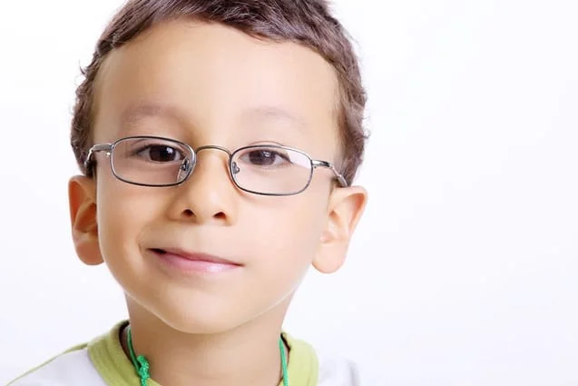 a child wearing new eyeglasses