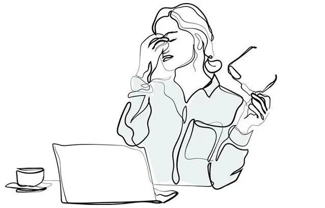 Woman holding nose in sinus pain