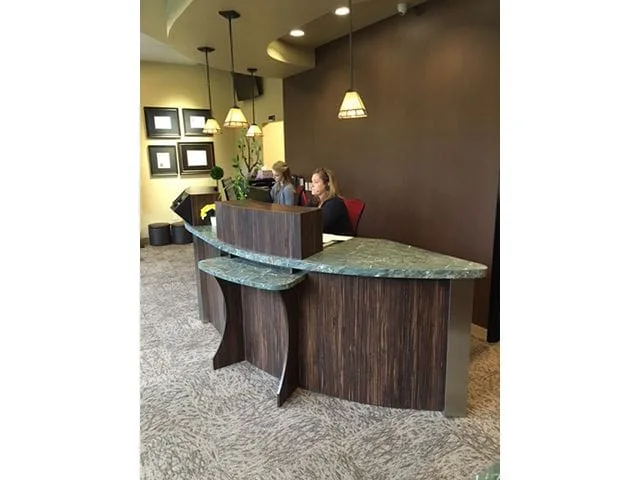 A photo of a female receptionist