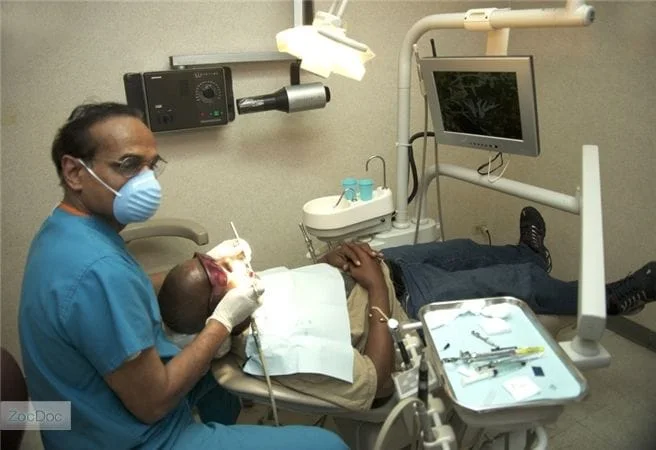 Dr. Verma with patient - Elmhurst Dentist