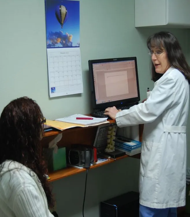 Dr. Cheryl Stanley with Patient.jpg