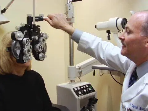 Dr. Bloch performing Eye Exam with patient